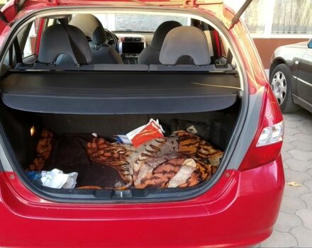 Красный Хонда Джаз, объемом двигателя 1.3 л и пробегом 295 тыс. км за 4555 $, фото 4 на Automoto.ua