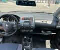Красный Хонда Джаз, объемом двигателя 1.34 л и пробегом 315 тыс. км за 3200 $, фото 16 на Automoto.ua