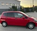 Красный Хонда Джаз, объемом двигателя 1.34 л и пробегом 235 тыс. км за 2950 $, фото 5 на Automoto.ua