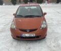 Красный Хонда Джаз, объемом двигателя 1.4 л и пробегом 325 тыс. км за 1700 $, фото 1 на Automoto.ua