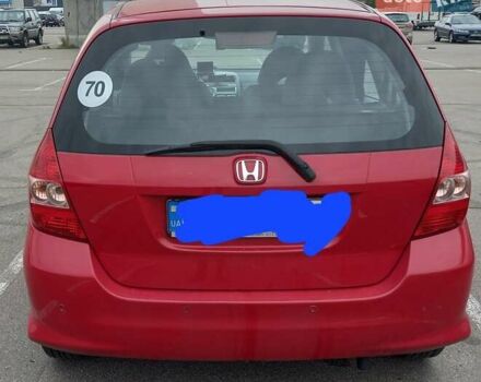 Красный Хонда Джаз, объемом двигателя 1.34 л и пробегом 190 тыс. км за 5500 $, фото 3 на Automoto.ua