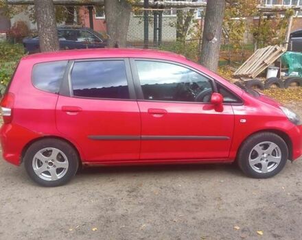 Красный Хонда Джаз, объемом двигателя 1.25 л и пробегом 200 тыс. км за 4000 $, фото 5 на Automoto.ua