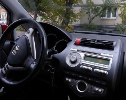 Красный Хонда Джаз, объемом двигателя 1.3 л и пробегом 137 тыс. км за 4700 $, фото 1 на Automoto.ua