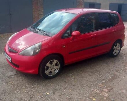 Красный Хонда Джаз, объемом двигателя 1.25 л и пробегом 200 тыс. км за 4000 $, фото 1 на Automoto.ua