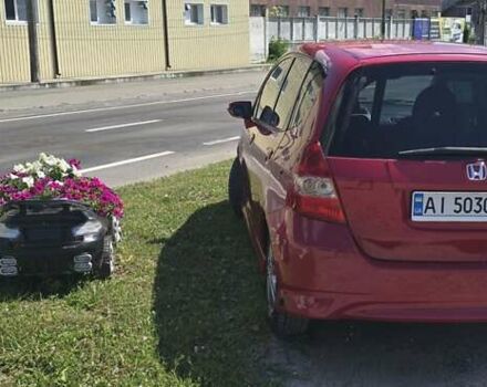 Красный Хонда Джаз, объемом двигателя 1.34 л и пробегом 210 тыс. км за 6200 $, фото 13 на Automoto.ua