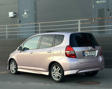 Красный Хонда Джаз, объемом двигателя 1.34 л и пробегом 90 тыс. км за 7300 $, фото 4 на Automoto.ua