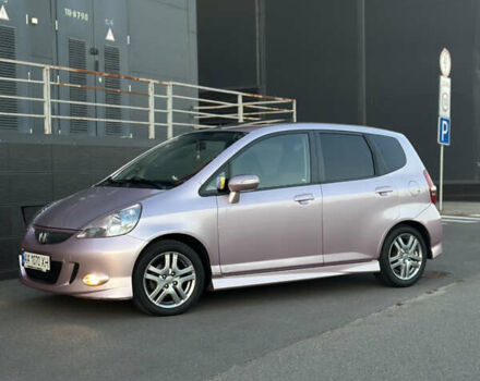 Красный Хонда Джаз, объемом двигателя 1.34 л и пробегом 90 тыс. км за 7300 $, фото 2 на Automoto.ua