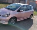 Червоний Хонда Джаз, об'ємом двигуна 1.3 л та пробігом 121 тис. км за 6500 $, фото 1 на Automoto.ua
