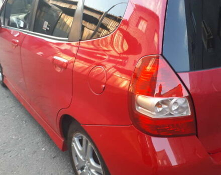 Красный Хонда Джаз, объемом двигателя 1.34 л и пробегом 158 тыс. км за 6200 $, фото 1 на Automoto.ua