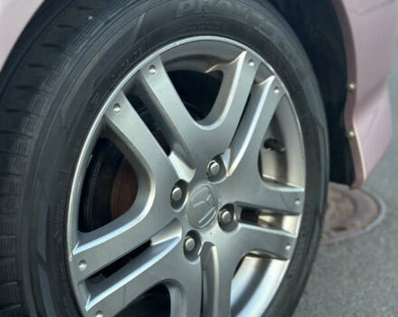 Красный Хонда Джаз, объемом двигателя 1.34 л и пробегом 90 тыс. км за 7300 $, фото 6 на Automoto.ua