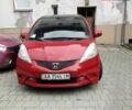 Червоний Хонда Джаз, об'ємом двигуна 1.34 л та пробігом 130 тис. км за 5999 $, фото 1 на Automoto.ua