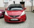 Червоний Хонда Джаз, об'ємом двигуна 1.34 л та пробігом 130 тис. км за 6500 $, фото 1 на Automoto.ua