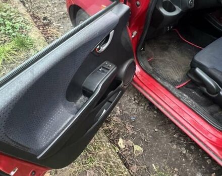 Красный Хонда Джаз, объемом двигателя 1.2 л и пробегом 218 тыс. км за 4500 $, фото 6 на Automoto.ua