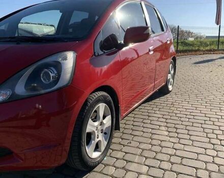 Червоний Хонда Джаз, об'ємом двигуна 1.34 л та пробігом 162 тис. км за 5750 $, фото 12 на Automoto.ua