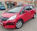 Красный Хонда Джаз, объемом двигателя 1.3 л и пробегом 154 тыс. км за 7300 $, фото 1 на Automoto.ua
