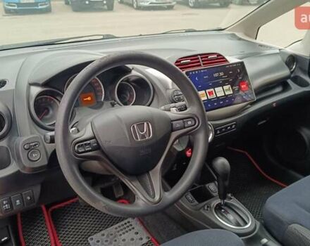 Красный Хонда Джаз, объемом двигателя 1.3 л и пробегом 154 тыс. км за 7300 $, фото 3 на Automoto.ua