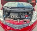 Красный Хонда Джаз, объемом двигателя 1.34 л и пробегом 112 тыс. км за 6500 $, фото 1 на Automoto.ua