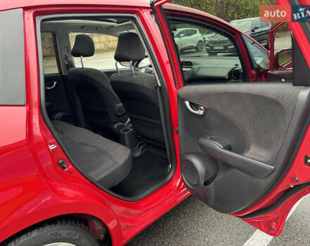 Красный Хонда Джаз, объемом двигателя 1.34 л и пробегом 107 тыс. км за 9500 $, фото 14 на Automoto.ua