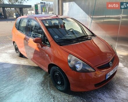 Красный Хонда Джаз, объемом двигателя 1.4 л и пробегом 100 тыс. км за 1600 $, фото 1 на Automoto.ua