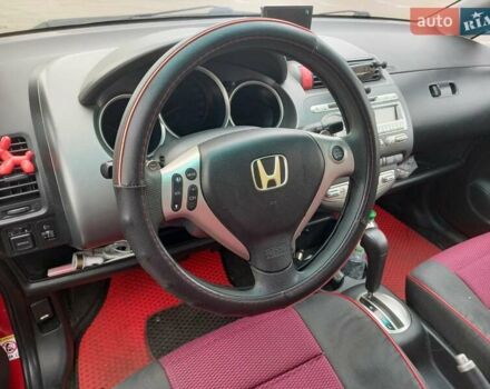 Красный Хонда Джаз, объемом двигателя 1.34 л и пробегом 190 тыс. км за 5500 $, фото 1 на Automoto.ua