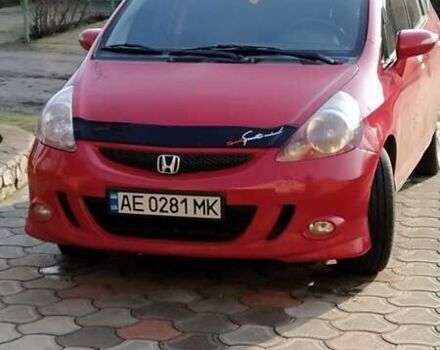 Красный Хонда Джаз, объемом двигателя 1.34 л и пробегом 128 тыс. км за 5650 $, фото 1 на Automoto.ua