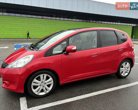 Красный Хонда Джаз, объемом двигателя 1.34 л и пробегом 107 тыс. км за 9500 $, фото 1 на Automoto.ua