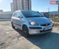 Серый Хонда Джаз, объемом двигателя 1.4 л и пробегом 215 тыс. км за 3800 $, фото 1 на Automoto.ua