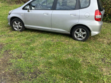 Серый Хонда Джаз, объемом двигателя 1.25 л и пробегом 195 тыс. км за 6500 $, фото 1 на Automoto.ua