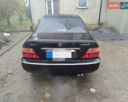 Черный Хонда Легенд, объемом двигателя 3.5 л и пробегом 200 тыс. км за 3800 $, фото 1 на Automoto.ua
