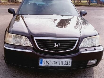 Черный Хонда Легенд, объемом двигателя 3.5 л и пробегом 320 тыс. км за 3500 $, фото 1 на Automoto.ua
