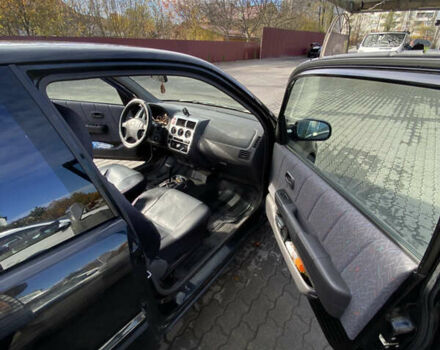 Чорний Хонда Лого, об'ємом двигуна 1.34 л та пробігом 195 тис. км за 3400 $, фото 7 на Automoto.ua