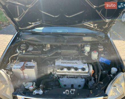 Черный Хонда Лого, объемом двигателя 1.4 л и пробегом 200 тыс. км за 2600 $, фото 4 на Automoto.ua