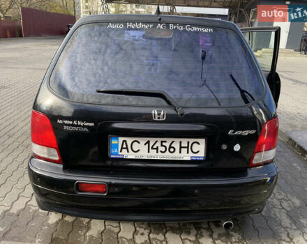Чорний Хонда Лого, об'ємом двигуна 1.34 л та пробігом 195 тис. км за 3400 $, фото 4 на Automoto.ua