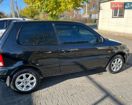Черный Хонда Лого, объемом двигателя 1.4 л и пробегом 200 тыс. км за 2600 $, фото 3 на Automoto.ua
