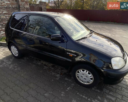 Чорний Хонда Лого, об'ємом двигуна 1.34 л та пробігом 195 тис. км за 3400 $, фото 1 на Automoto.ua