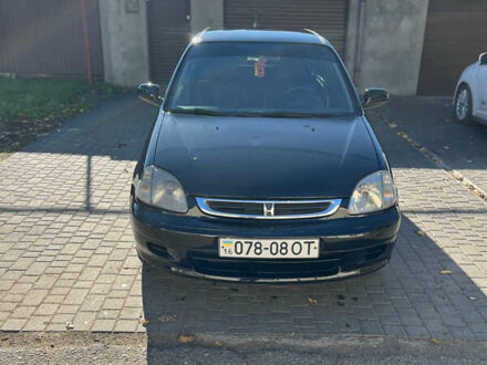 Черный Хонда Лого, объемом двигателя 1.4 л и пробегом 200 тыс. км за 2600 $, фото 1 на Automoto.ua