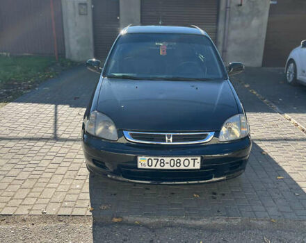 Черный Хонда Лого, объемом двигателя 1.4 л и пробегом 200 тыс. км за 2600 $, фото 1 на Automoto.ua