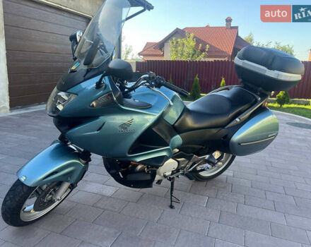 Синий Хонда NT 700V, объемом двигателя 0.68 л и пробегом 58 тыс. км за 4400 $, фото 7 на Automoto.ua