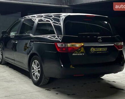 Черный Хонда Одиссей, объемом двигателя 3.47 л и пробегом 314 тыс. км за 12000 $, фото 3 на Automoto.ua