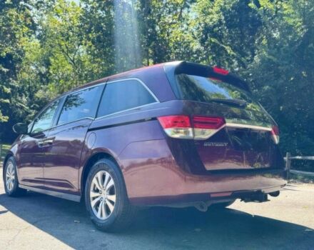 Красный Хонда Одиссей, объемом двигателя 3.5 л и пробегом 68 тыс. км за 22000 $, фото 3 на Automoto.ua