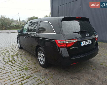 Хонда Одиссей, объемом двигателя 3.5 л и пробегом 290 тыс. км за 11500 $, фото 4 на Automoto.ua