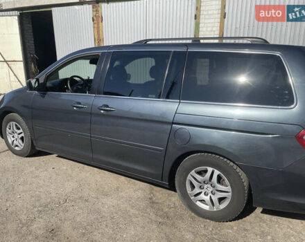 Серый Хонда Одиссей, объемом двигателя 3.5 л и пробегом 300 тыс. км за 6499 $, фото 3 на Automoto.ua