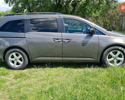 Серый Хонда Одиссей, объемом двигателя 3.47 л и пробегом 301 тыс. км за 11850 $, фото 2 на Automoto.ua