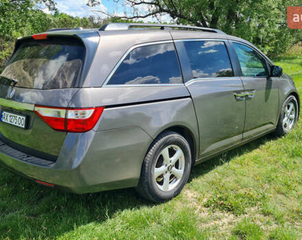 Серый Хонда Одиссей, объемом двигателя 3.47 л и пробегом 301 тыс. км за 11850 $, фото 3 на Automoto.ua