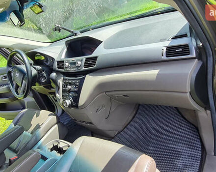 Серый Хонда Одиссей, объемом двигателя 3.47 л и пробегом 301 тыс. км за 11850 $, фото 20 на Automoto.ua