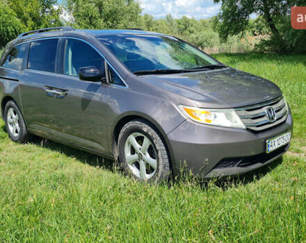 Серый Хонда Одиссей, объемом двигателя 3.47 л и пробегом 301 тыс. км за 11850 $, фото 1 на Automoto.ua