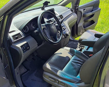 Серый Хонда Одиссей, объемом двигателя 3.47 л и пробегом 301 тыс. км за 11850 $, фото 13 на Automoto.ua