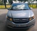 Серый Хонда Одиссей, объемом двигателя 3.47 л и пробегом 290 тыс. км за 15000 $, фото 1 на Automoto.ua