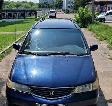 Синий Хонда Одиссей, объемом двигателя 3.5 л и пробегом 210 тыс. км за 4400 $, фото 3 на Automoto.ua
