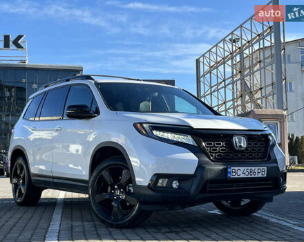 Белый Хонда Пасспорт, объемом двигателя 3.47 л и пробегом 14 тыс. км за 25499 $, фото 2 на Automoto.ua